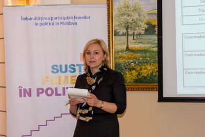 Oxana Domenti, a 43-year-old MP and Chair of the Social Protection, Health and Family Committee of Moldova’s Parliament. Photo: UN Programme `Women in Politics`/ Dorin Goian