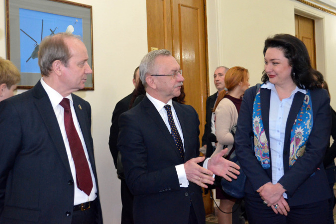 Ivan Rusnak, the First Deputy Minister of Defense, Ihor Dolgov, Deputy Minister of Defense on European Integration, and Anastasia Divinskaya, UN Women Gender Advisor, at the opening of the exhibition