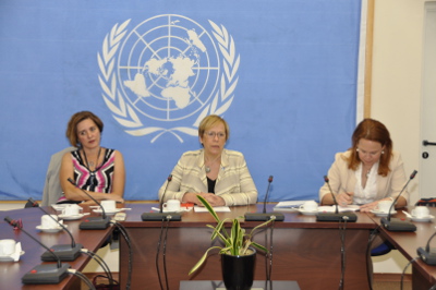 Flanked by Senior UN Political Officer Angela Bargellini and UN Women Policy Adviser on Governance, Peace and Security, Dr. Sabine Freizer, Ms. Ingibjorg Solrun Gisladottir, UN Women’s Regional Director for Europe and Central Asia and Representative to Turkey, addresses members of the bicommunal Technical Committee on Gender Equality on 5 May while on a visit to the island. UNFICYP/Robert Szakszon