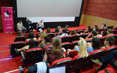 Award-winning filmmaker Mehrdad Oskouei and Andrew Russell, UN Development Coordinator in Kosovo discussing about the role of men and boys in achiving gender equality after the screening of the Iranian film “Starless Dreams” during the launching of Kosovo’s HeForShe campaign at the documentary and short film festival Dokufest on August 10, 2016 in Prizren, Kosovo.  Photo: Dokufest/Tughan Anıt