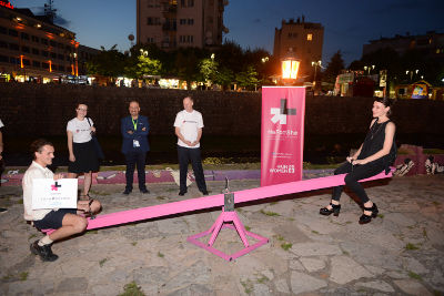 Inauguration of the see saw installation on August 10 during the documentary and short film festival Dokufest: Artists Tadi Suhodolli and Dardan Zhegrova showing how they need each other to lift each other up. Photo: Dokufest_Tughan Anıt