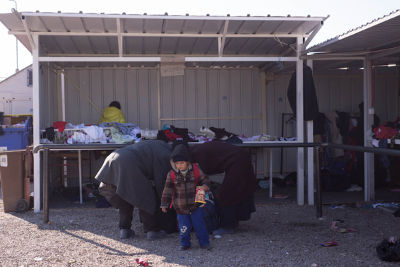 Women collecting donated clothes for themselves and their children in Tabanovce near the Macedonia and Serbia border, photo credit: Mirjana Nedeva