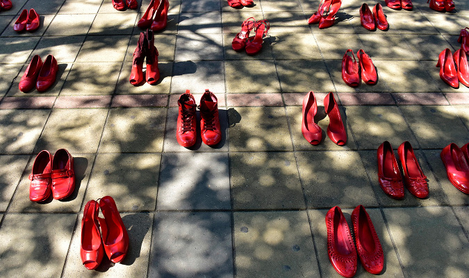 40 pairs of red shoes have found its place in front of the Serbian Government's building as a reminder that more than 40 women in the country are killed every year by their intimate partner.  Photo: Marija Jankovic