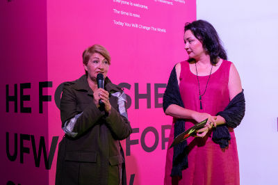 Iryna Danylevska, founder of Ukrainian Fashion Week (on the left) and Anastasia Divinskaya, Representative of the UN Women in Ukraine (on the right) deliver an opening speech at the Ukrainian Fashion Week. Photo:UN Women/Volodymyr Shuvayev