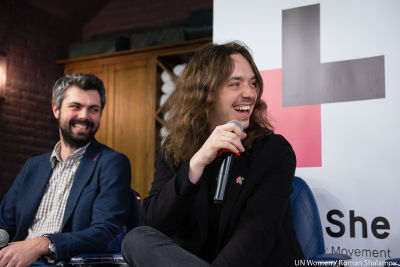 Anton Drobovych, an expert in culture and philosophy, and Andriy Klen, co-founder of the IT startup PetCube responding to the questions of the audience at the HeForShe Barbershop Talk. Photo: UN Women/Roman Shalamov