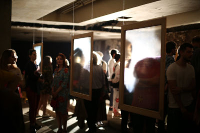 Participants at the "Be my face" exhibition,  portraying stories of conflict-related sexual violence survivors in Kosovo. Photo: FemART