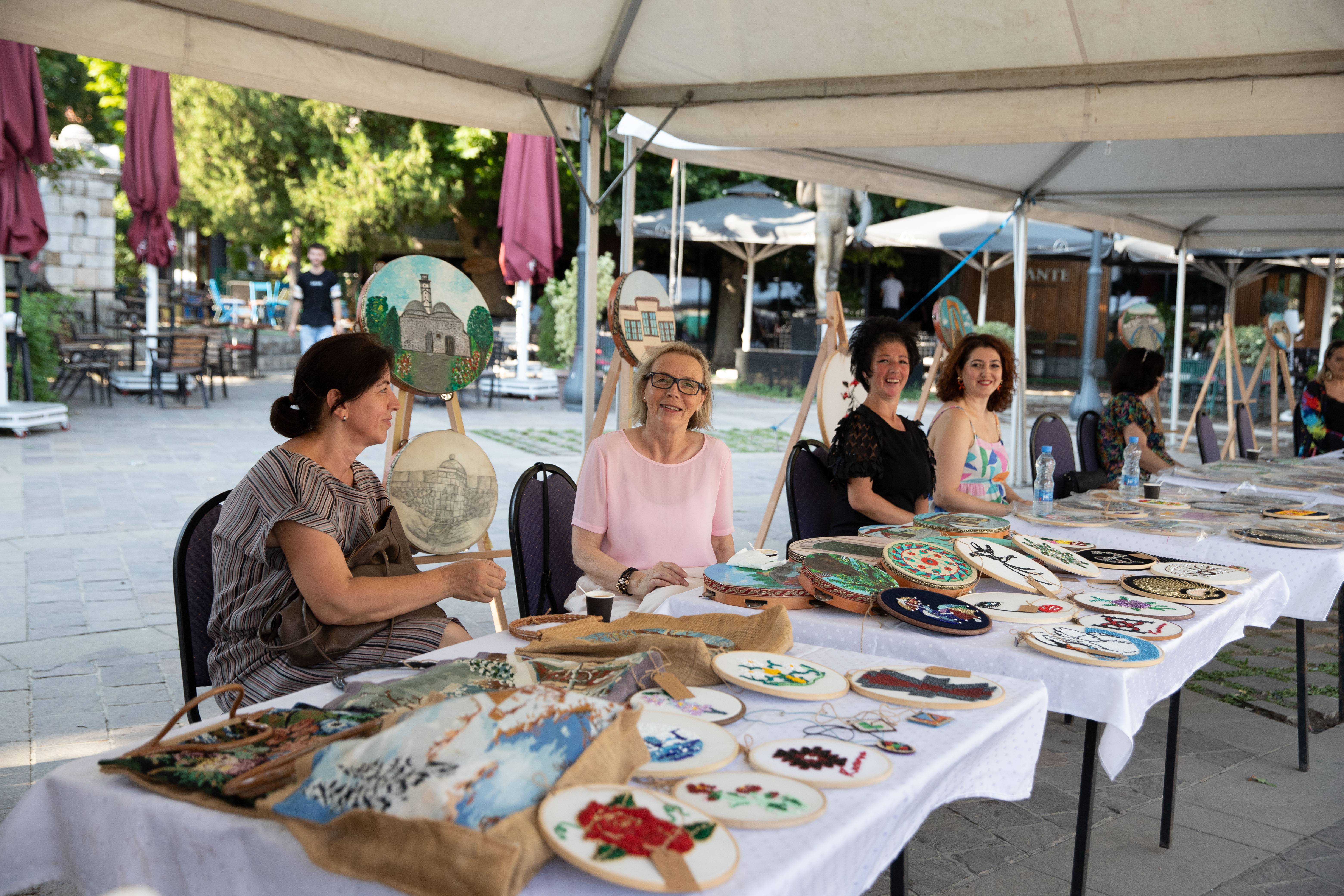 Women from the Mamusa Municipality and the Women’s Association Orkide, showcase their handicrafts during an exhibition at Dokufest in the municipality of Prizren. Photo: UN Women Kosovo