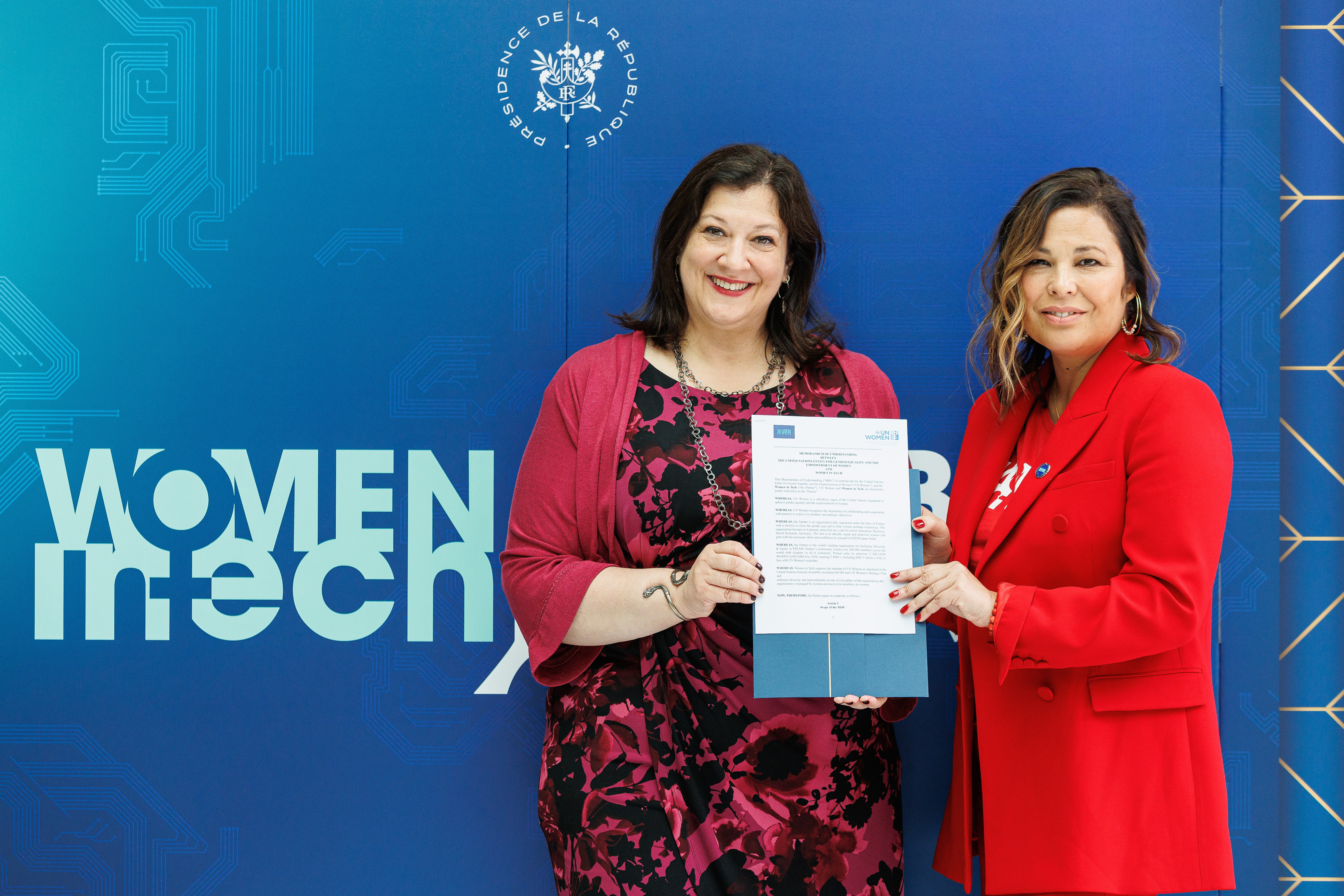 UN Women Regional Director for Europe and Central Asia, Alia El-Yassir, and Ayumi Moore Aoki, Founder, President and CEO of Women in Tech, signed a memorandum of understanding between the 2 entities to advance women and girls in ICT. Photo: Courtesy of Women in Tech. 