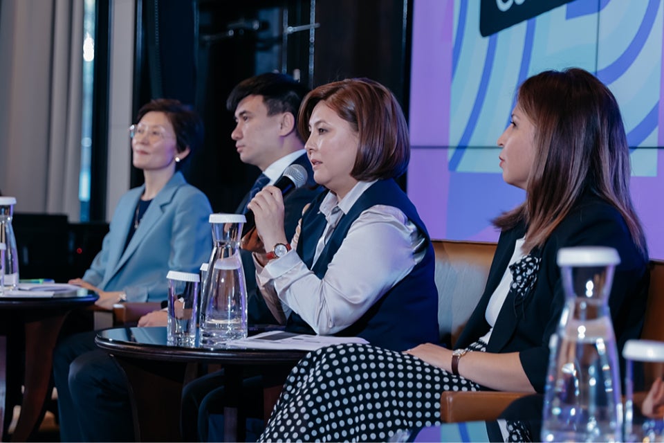 Women’s Entrepreneurship EXPO 2023 panel session participants discussing investment climate in Kyrgyzstan, its conditions and ecosystems. 