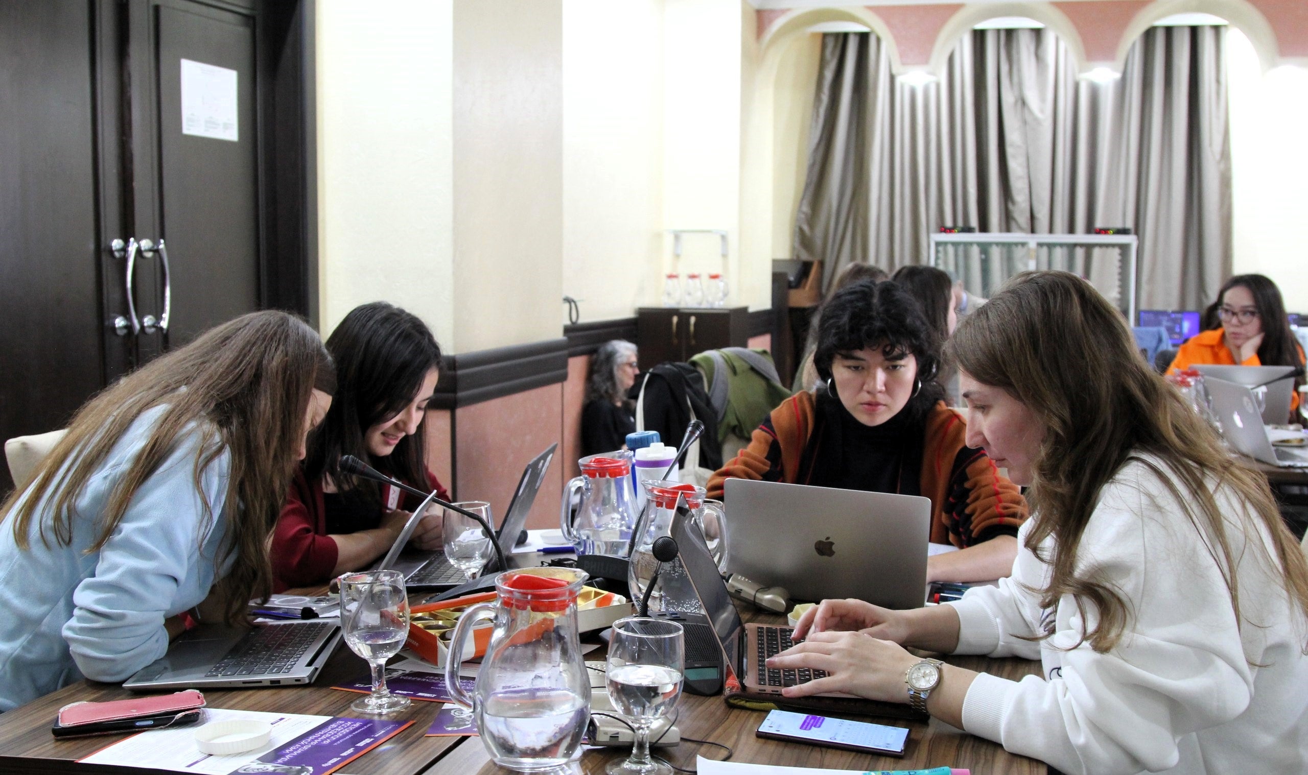 Twenty researchers, gender advocates and journalists collaborate at the femicide research workshop in Almaty, Kazakhstan. Photo: UN Women.