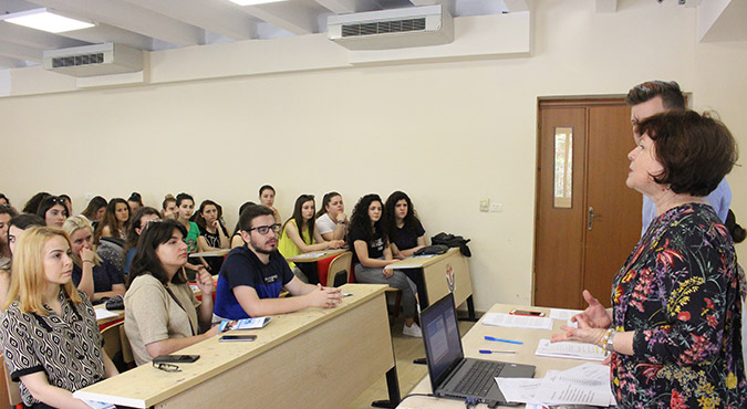 Bajana Ceveli of “Association of Women with Social Problems” with students of the Faculty of Law in Tirana, Albania. Photo: UN Women Albania