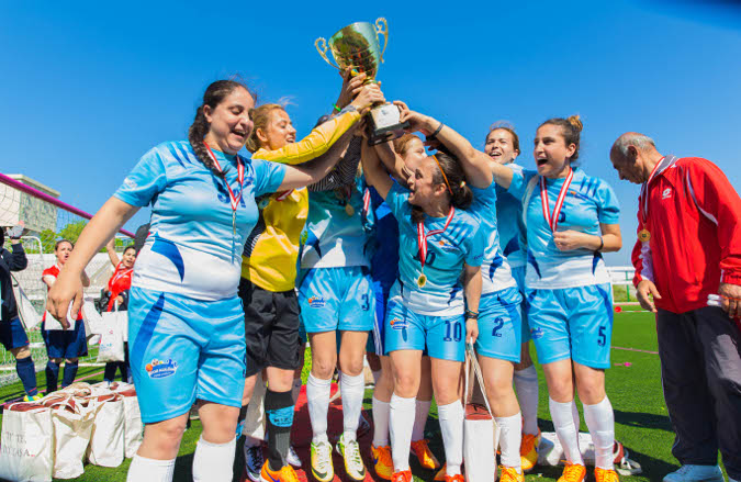 Turkish women football players celebrate the power of sports. Photo: Girls on the Field