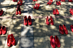 40 pairs of red shoes have found its place in front of the Serbian Government's building as a reminder that more than 40 women in the country are killed every year by their intimate partner.  Photo: Marija Jankovic