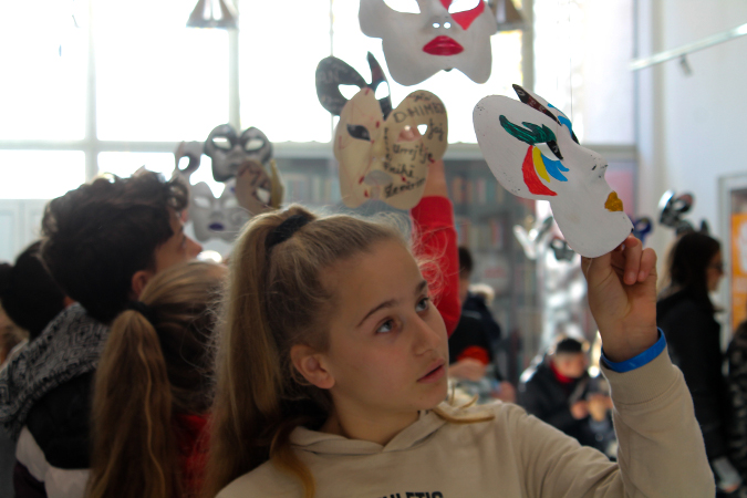 Albania - Tear off the mask event - high school students read real stories of women victims of violence presented artistically behind masks 2- Dec 6
