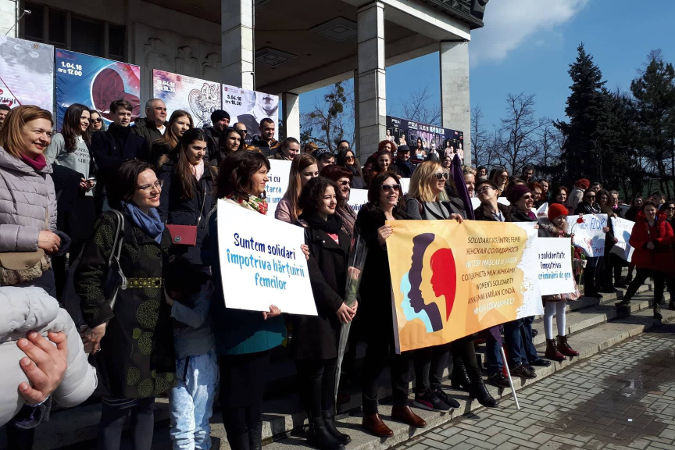 Women and men standing in solidarity with all women. They held speeches about the true meaning of gender equality, that #timeisnow to end gender-based violence and how important it is to support women's rights movement. photo credits: UN Women Moldova/Marina Vatav