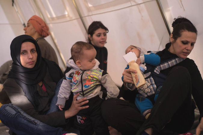 Refugee women who crossed Western Balkans from Turkey. Photo: UN Women / Mirjana Nedeva
