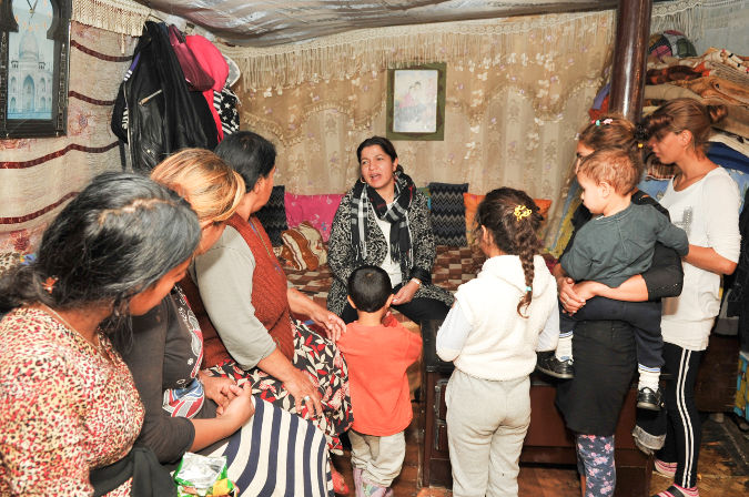 Roma Women Rights Center representative visiting Roma camp and "Iliria" neighborhood in Shkodra, to inform the community about the services available for women victims of violence. Photo credit: UN Women Albania