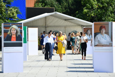 Exhibition in the city center of Pristina featuring portraits of Women’s Caucus Members. Photo: UN Women