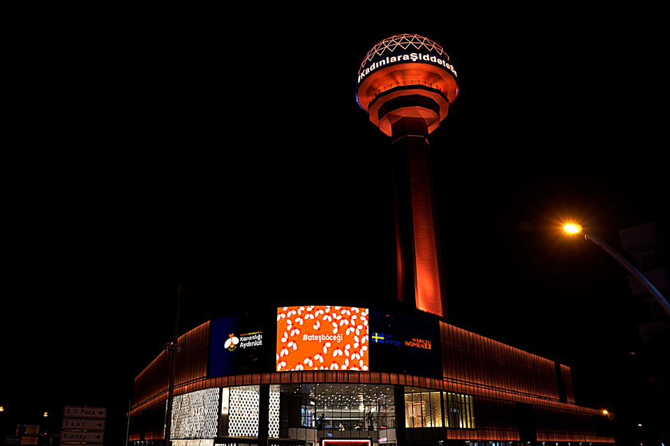 Atakule, a tower in the capital city of Turkey, lit up in orange.