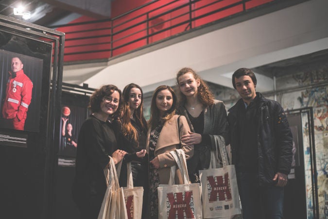 Students posing at the exhibition. Photo: UN Women/ Irina Krstevska