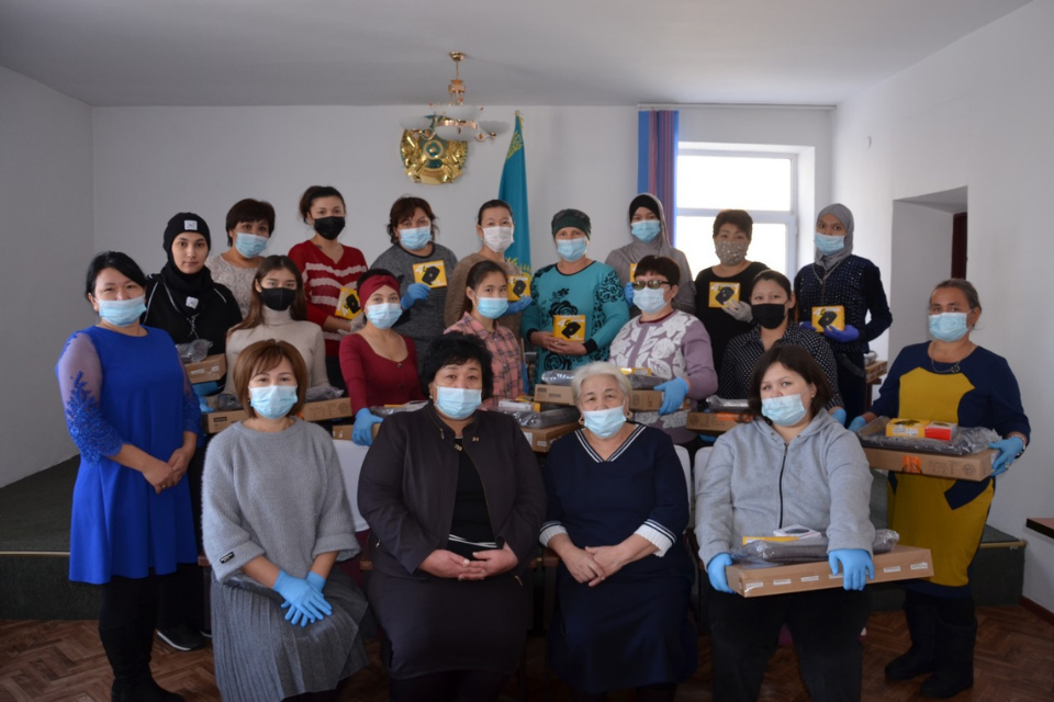 A group of UN Women beneficiaries in the local administration office of Nurly village receiving technical support package. Photo: Arken Mametvakiyev