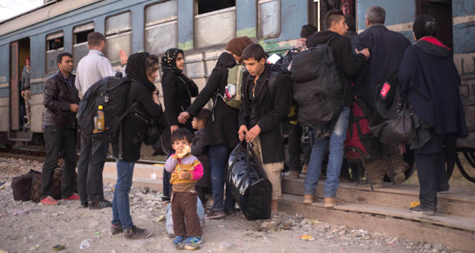 Refugees getting ready for the train in Gevgelija to travel to the border with Serbia. 