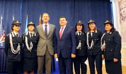 Anila Popa (far right) was one of five women police officers to graduate from the ICITAP-UN Women training in 2015. They stand alongside Bill Morrell, Strategic Police Advisor, ICITAP Albania (centre-left) and the Director of the Albanian State Police, Haki Çako (centre-right), who is also a HeForShe champion. Photo: UN Women/Besnik Bak