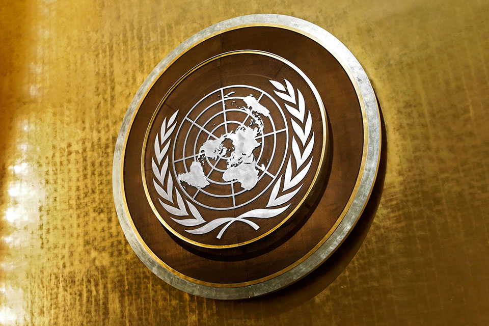 UN logo in the General Assembly hall at UN headquarters in New York. Photo: UN Women/Ryan Brown