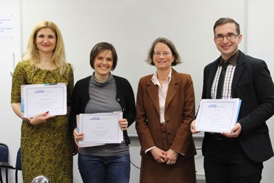 UN Women Representative to Bosnia and Herzegovina, Anne-Marie- Esper Larsen, (second to the right) poses with the three winning writers.