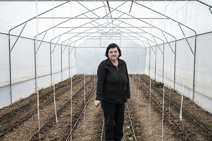Zilha Kurešević, in her strawberry farm in Samac, Bosnia and Herzegovina. UN Women worked with local municipality of Samac to improve gender responsive budgeting. As a result, Kuresevic received a grant from the government to purchase drip irrigation system and strawberry seeds. Photo: UN Women/Rena Effendi