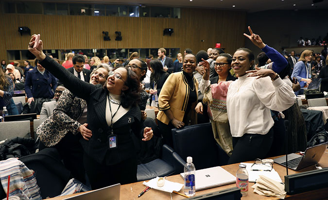 Participants at the 62nd session of the UN Commission on the Status of Women celebrate the adoption of CSW62 Agreed Conclusions Photo: UN Women/Ryan Brown