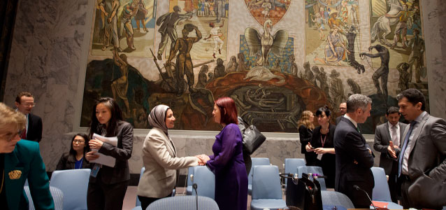 Prior to the opening of the open debate, Suaad Allami greets María Cristina Perceval, Permanent Representative of Argentina to the UN and President of the Security Council for October.