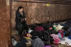 Citizens of Kyiv, Ukraine, spend the night at the metro station Heroes of the Dnieper during the first days of the invasion in February 2022. Photo: UN Women/Serhii Korovainyi