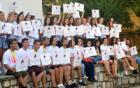 The 120 young volunteers are holding up HeForShe cards in Albanian, Serbian and English language. Of the young volunteers 50 were boys and 70 girls. Photo: UN Women/Isabelle Jost