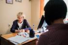 Natalia Minayeva consults with a woman living with HIV. Photo: UN Women MCO Kazakhstan
