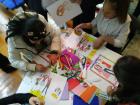 Children working on the alternative story of the comic book. Photo: UN Women in Kyrgyzstan