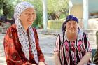 Bubuaisha Kurbanova and Nodira Avezova live on opposite sides of the Tajik-Kyrgyz border. Photo: UN Women/Aijamal Duishebaeva